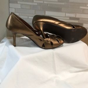 Bronze color high heels.